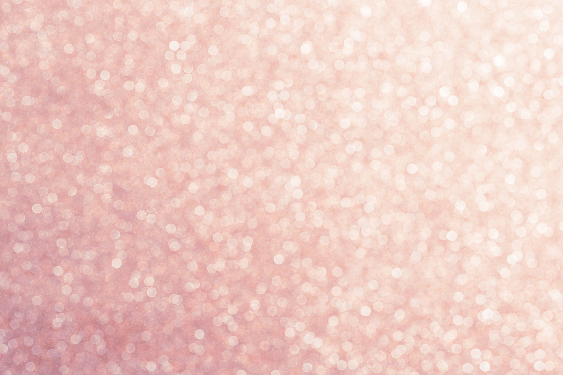 Pink gold glitter bokeh background