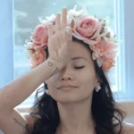 Ella channeling Light Language codes with a flower crown on